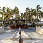 photo for the pool bar at fanar hotel and the palm trees around at Hawana Salalah Oman