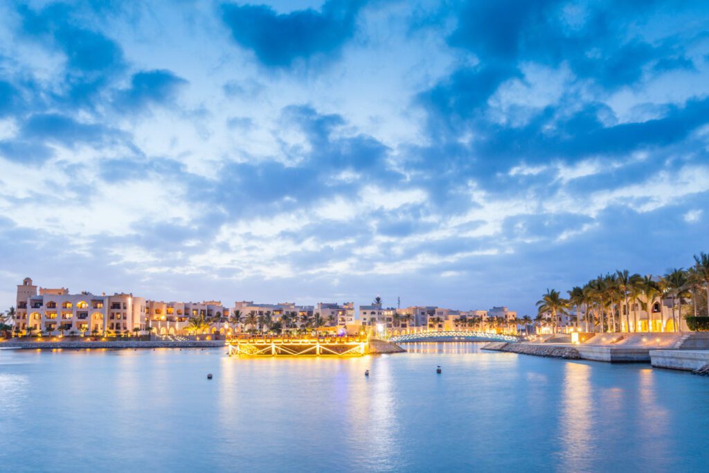 dusk over the lagoon at at fanar resort in hawana salalah oman