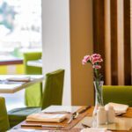 sitting table inside al manara restaurant at juweira boutique hotel for adult only in hawana salalah