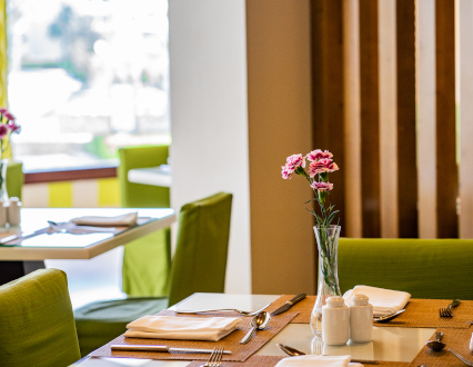 sitting table inside al manara restaurant at juweira boutique hotel for adult only in hawana salalah