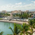 Photo for building and lagoon with palm trees at Hawana Salalah Oman